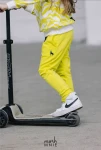 Spodnie dziewczęce dresowe WOLF mashMNIE żółte - maWer Fashion