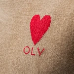 Dzianinowy t-shirt męski OLAVOGA LUV 2025 beżowy - maWer Fashion