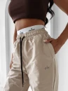 Spodnie damskie OLAVOGA RAINY DAY 2025 beige - maWer Fashion