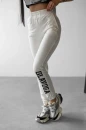 Spodnie damskie OLAVOGA SUGAR 2025 ecru - maWer Fashion