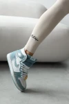 Legginsy damskie OLAVOGA LARIX 2025 beżowe - maWer Fashion