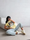 T-shirt damski OLAVOGA EARNED 2026 żółty - maWer Fashion
