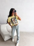 T-shirt damski OLAVOGA EARNED 2026 żółty - maWer Fashion